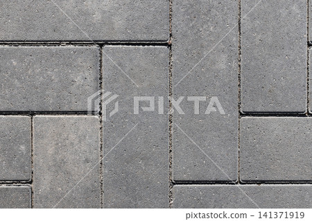 Detailed close-up top view of gray concrete pavers Detailed close-up top view of gray concrete pavers 141371919