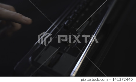 Choosing Playback Control. Detailed View Of Finger Pressing Tiny Button For Playback On Stereo Device. Media Choosing Playback Control. Detailed View Of Finger Pressing Tiny Button For Playback On Stereo Device. Media 141372440