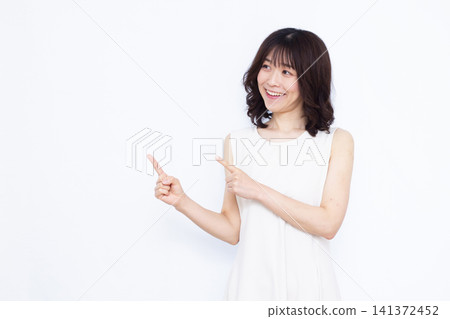 woman pointing finger woman pointing finger 141372452