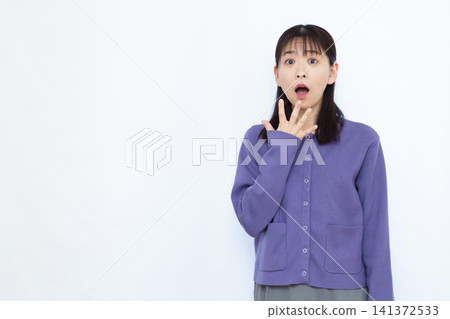 Surprised and amazed woman Surprised and amazed woman 141372533