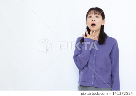 Surprised and amazed woman Surprised and amazed woman 141372534