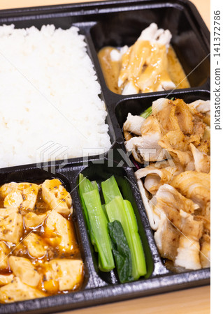 Delicious Sichuan cuisine: Chinese bento box with Yunbai Rou (steamed pork with garlic sauce) Delicious Sichuan cuisine: Chinese bento box with Yunbai Rou (steamed pork with garlic sauce) 141372786