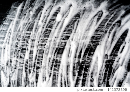 Soap foam on black background Soap foam on black background 141372896