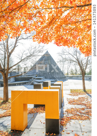 Autumn leaves and a pyramid-shaped toilet at Moerenuma Park, Sapporo City Autumn leaves and a pyramid-shaped toilet at Moerenuma Park, Sapporo City 141373893