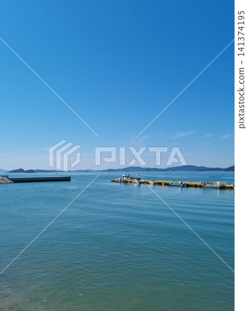 This is the sea where fishing boats are anchored. This is the sea where fishing boats are anchored. 141374195