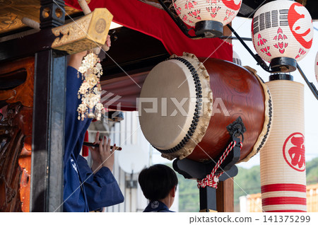 Festival music played on top of a float, featuring Japanese drums and flutes. Festival music played on top of a float, featuring Japanese drums and flutes. 141375299
