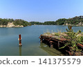 The rusty iron pier and the sea in the cove of Nonoshima Island (Shiogama City, Miyagi Prefecture) 141375579