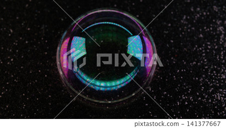 Psychedelic bubble. Oil pigment. Circle lens frame on defocused grain black background. Abstract floating gasoline ink blend fluid. Psychedelic bubble. Oil pigment. Circle lens frame on defocused grain black background. Abstract floating gasoline ink blend fluid. 141377667