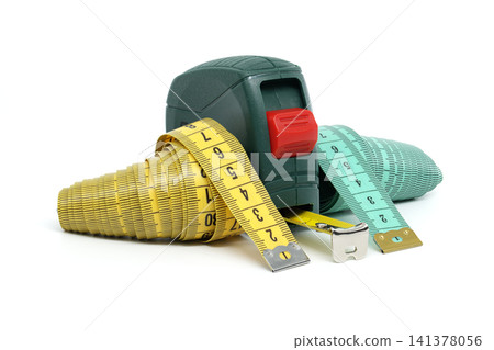 Assorted Measuring Tapes and Retractable Tape Measure on White Background for Measurement and DIY Assorted Measuring Tapes and Retractable Tape Measure on White Background for Measurement and DIY 141378056