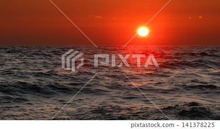 A beautiful sunset over the Sea of Japan, seen along the Orolon Line near Rumoi, Hokkaido in the summer. A beautiful sunset over the Sea of Japan, seen along the Orolon Line near Rumoi, Hokkaido in the summer. 141378225