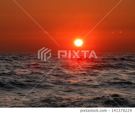A beautiful sunset over the Sea of Japan, seen along the Orolon Line near Rumoi, Hokkaido in the summer. A beautiful sunset over the Sea of Japan, seen along the Orolon Line near Rumoi, Hokkaido in the summer. 141378229