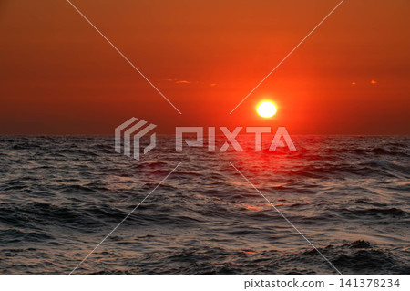 A beautiful sunset over the Sea of Japan, seen along the Orolon Line near Rumoi, Hokkaido in the summer. A beautiful sunset over the Sea of Japan, seen along the Orolon Line near Rumoi, Hokkaido in the summer. 141378234