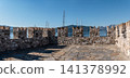 Medieval stone battlements overlooking sea bay in Marmaris Turkey 141378992