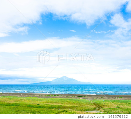 A view of Mount Rishiri floating on the Sea of Japan, seen from near Bakka, Wakkanai City, Hokkaido, in summer. A view of Mount Rishiri floating on the Sea of Japan, seen from near Bakka, Wakkanai City, Hokkaido, in summer. 141379312