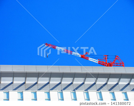 Tower crane and blue sky landscape Tower crane and blue sky landscape 141380072