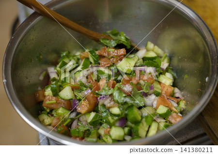 Moroccan-style fresh salad 141380211