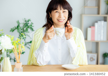 A lovely middle-aged woman A lovely middle-aged woman 141380452