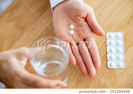 Middle-aged and senior women who take regular medication Middle-aged and senior women who take regular medication 141380496