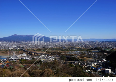 The mountain range of Mt. Ashitaka and the city of Fuji, January. Fuji City 11 roadside stations: Fujikawa Rakusa, Tomei Fujikawa SA, Amagoiyama Observatory. The mountain range of Mt. Ashitaka and the city of Fuji, January. Fuji City 11 roadside stations: Fujikawa Rakusa, Tomei Fujikawa SA, Amagoiyama Observatory. 141380883
