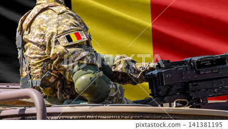 Belgium flag with soldier at machinegun turret 141381195