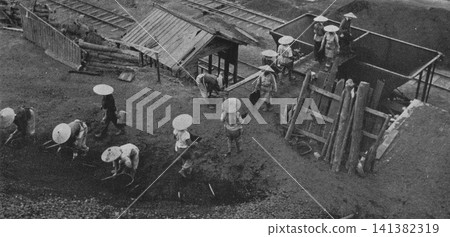 Old photograph, 1951, Fukuoka Prefecture: People picking up usable coal from a slag heap (a pile of rock waste) in the Chikuhō coalfield. Old photograph, 1951, Fukuoka Prefecture: People picking up usable coal from a slag heap (a pile of rock waste) in the Chikuhō coalfield. 141382319