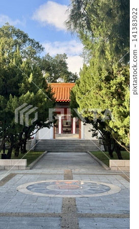 Ornamental garden path leading toward a red roof pavilion Ornamental garden path leading toward a red roof pavilion 141383022