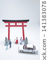 Miniature figure scene at a Shinto torii gate. 141383078
