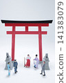 Miniature figure scene at a Shinto torii gate. 141383079