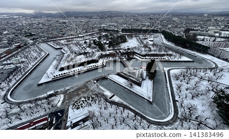 Aerial panorama of a snow covered star shaped fortress Aerial panorama of a snow covered star shaped fortress 141383496