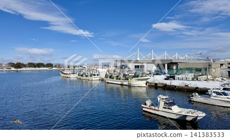 Panoramic fishing harbor with boats and snowy mountains Panoramic fishing harbor with boats and snowy mountains 141383533