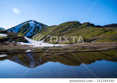 Mount Hiuchi in early summer (Myoko, Niigata Prefecture) Mount Hiuchi in early summer (Myoko, Niigata Prefecture) 141384340