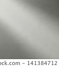 Diagonal lighting enhances dramatic effects on plain wall surface 141384712