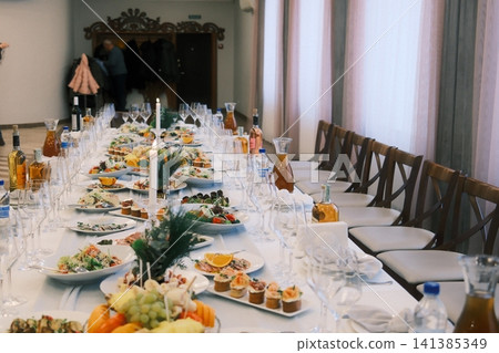 Elegant banquet table prepared for a special event Elegant banquet table prepared for a special event 141385349