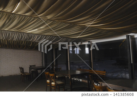 Empty dining area with gold fabric ceiling at night 141385608