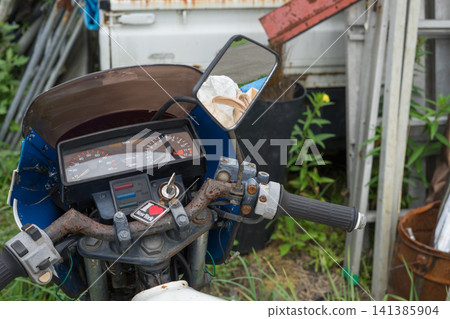 Abandoned snowmobile Abandoned snowmobile 141385904