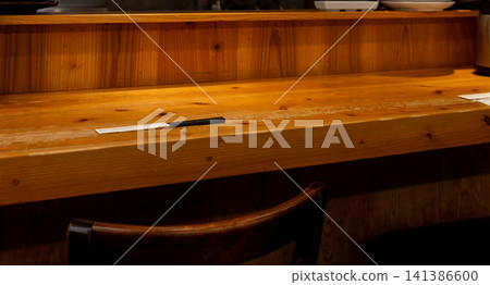 Wooden counter seats in a restaurant Wooden counter seats in a restaurant 141386600