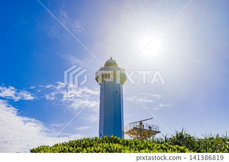 Miyako Island, Higashi-Hennazaki Cape: A white lighthouse standing out against the blue sky Miyako Island, Higashi-Hennazaki Cape: A white lighthouse standing out against the blue sky 141386819