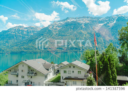 Beautiful scenery from the train window in Switzerland Beautiful scenery from the train window in Switzerland 141387396