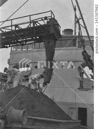 Old photograph, 1951, Kitakyushu City, Fukuoka Prefecture: Cranes at Wakamatsu Port loading coal from the Chikuhō coalfield. Old photograph, 1951, Kitakyushu City, Fukuoka Prefecture: Cranes at Wakamatsu Port loading coal from the Chikuhō coalfield. 141387662