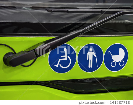 Accessibility symbols on a public bus showing support for various users in the city Accessibility symbols on a public bus showing support for various users in the city 141387718
