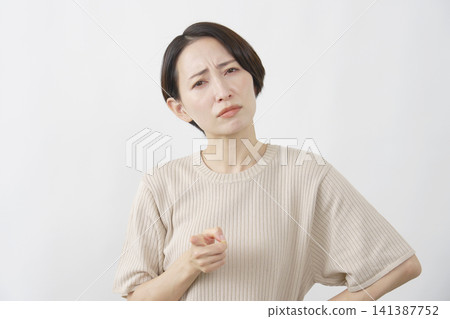 Female middle-aged complainer white background Female middle-aged complainer white background 141387752