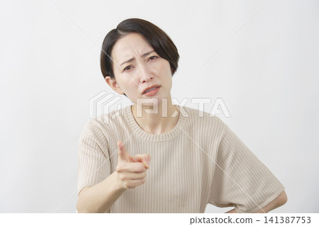 Female middle-aged complainer white background Female middle-aged complainer white background 141387753