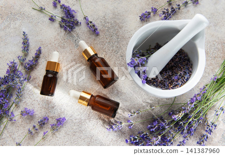 Lavender essential oil with aromatherapy droppers and dried flowers Lavender essential oil with aromatherapy droppers and dried flowers 141387960