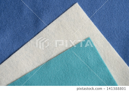 Stylish blue, light blue, and white fabric with diagonal borders. Stylish blue, light blue, and white fabric with diagonal borders. 141388801