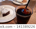 Iced coffee and chocolate cake to enjoy at a cafe 141389226