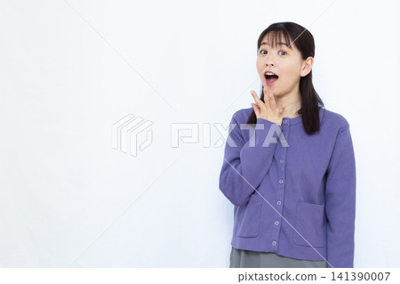 Smiling and surprised woman Smiling and surprised woman 141390007
