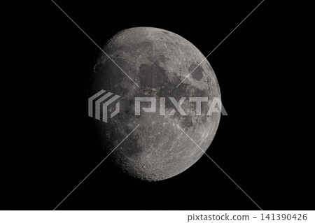The moon on the thirteenth night, with its craters clearly visible in the night sky. The moon on the thirteenth night, with its craters clearly visible in the night sky. 141390426