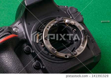 Camera malfunction; image shows a damaged SLR camera mount. Camera malfunction; image shows a damaged SLR camera mount. 141391329