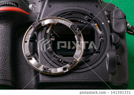 Camera malfunction; image shows a damaged SLR camera mount. Camera malfunction; image shows a damaged SLR camera mount. 141391331