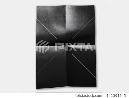 Mockup material of folded black paper placed on a light gray background. Mockup material of folded black paper placed on a light gray background. 141391345